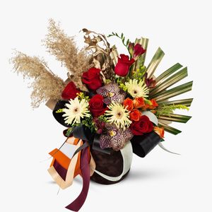 Box with freesias and pampas
