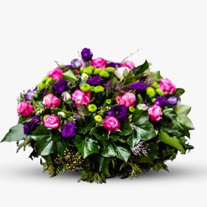 Funeral arrangement in shades of purple