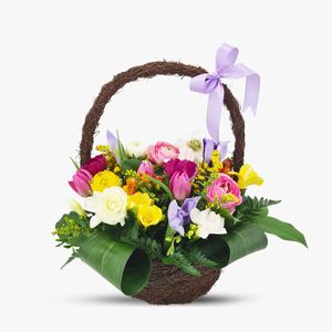 Basket with ranunculus and freesias