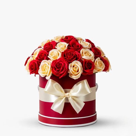 Box with red and white roses