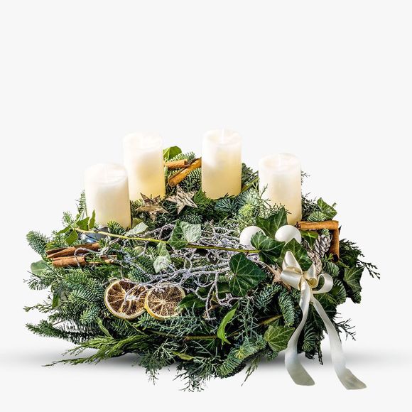 Advent wreath with fir and greenery