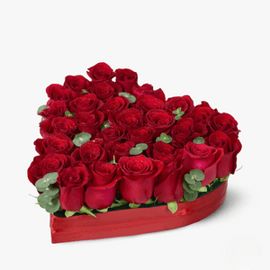 Heart-shaped arrangement of 31 red roses