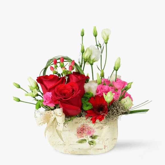 Floral arrangement with lace