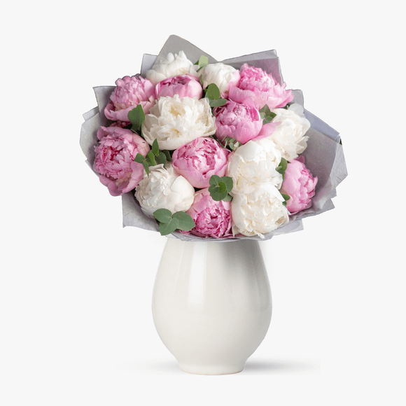 Bouquet of pink peonies and white peonies