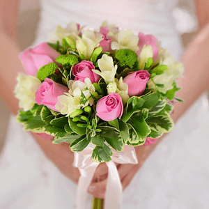 Bridal bouquet with roses and freesias