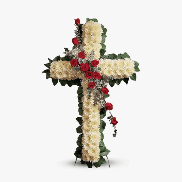 Funeral cross with white chrysanthemums and red roses