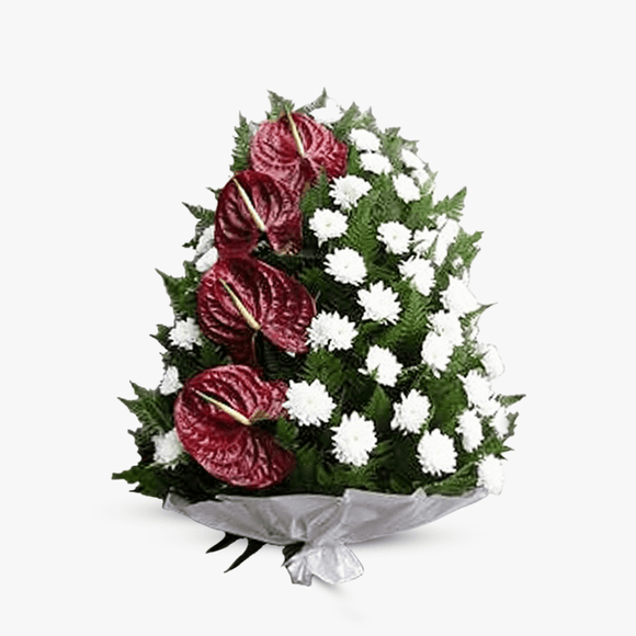 Funeral wreath with white chrysanthemums and red anthurium