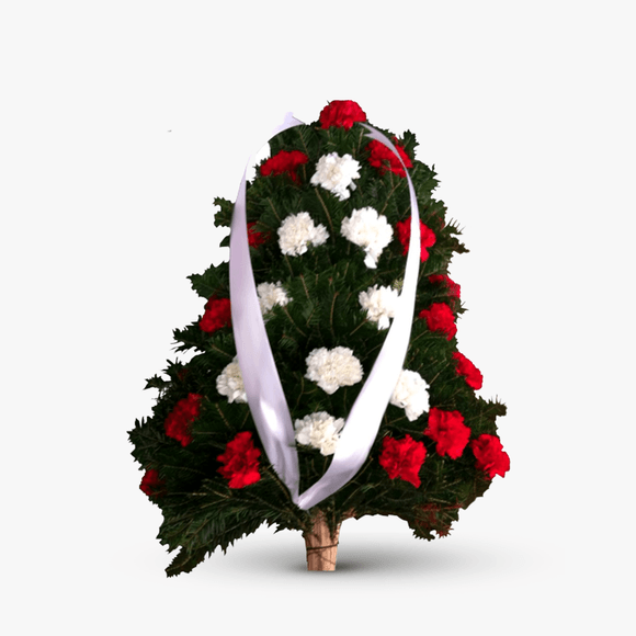 Funeral wreath with white and red carnations