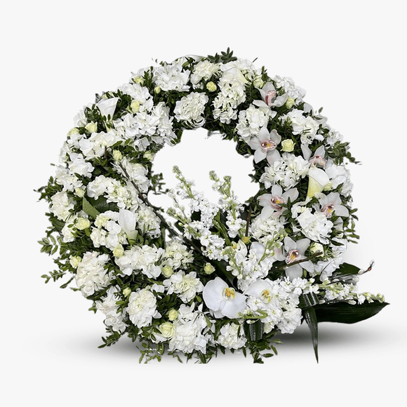 Funeral wreath with orchids, calla and hydrangeas