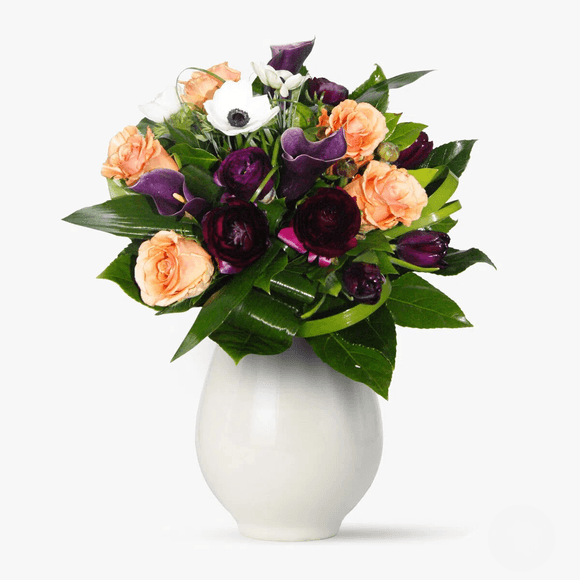 Bouquet with anemones and purple calla lilies