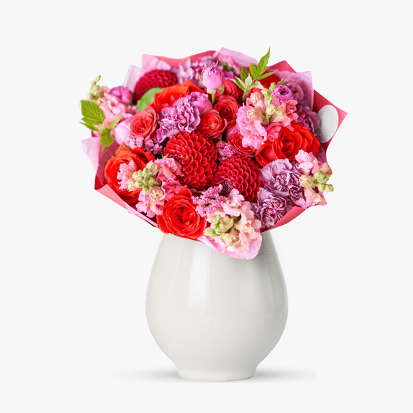 Bouquet with red dahlias and pink carnations