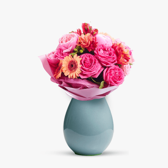 Multicolored bouquet with roses and gerbera